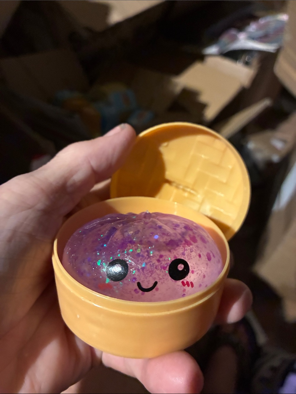 Mini squishy bun Purple Glitter Squishy in Yellow Capsule